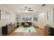 Sunlit home office with bay window, a modern desk, and stylish decor at 3603 Cr 626N, Bushnell, FL 33513