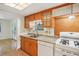 Functional kitchen with wood cabinets and ample counter space at 3603 Cr 626N, Bushnell, FL 33513