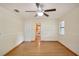 Open-concept living room with hardwood floors and ample space for furniture at 3603 Cr 626N, Bushnell, FL 33513