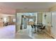 Open-concept floor plan showing the living room and eat-in kitchen at 8872 Sw 92Nd Pl # E, Ocala, FL 34481