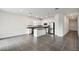 Spacious kitchen with stainless steel appliances and center island at 1122 James Paul Rd, Davenport, FL 33837