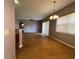 Open dining room with hardwood floors and neutral walls at 431 Bay Leaf Dr, Kissimmee, FL 34759