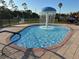 Community pool with mushroom-shaped fountain at 431 Bay Leaf Dr, Kissimmee, FL 34759