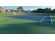 Well-maintained tennis court with green and blue surface at 431 Bay Leaf Dr, Kissimmee, FL 34759