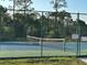 Private tennis court with chain link fence at 431 Bay Leaf Dr, Kissimmee, FL 34759