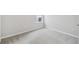Simple bedroom with grey carpet and window at 3068 Bootlace Way, St Cloud, FL 34771