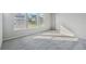 Spacious bedroom with carpet and large windows at 3068 Bootlace Way, St Cloud, FL 34771