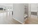 Hallway with built-in storage and access to a laundry area at 3068 Bootlace Way, St Cloud, FL 34771