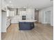 Spacious kitchen with a large island and modern finishes at 3068 Bootlace Way, St Cloud, FL 34771