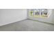 Spacious bedroom with a large window providing ample natural light at 3051 Bootlace Way, St Cloud, FL 34771