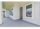 The outdoor patio has large windows and a door that leads to the backyard at 3051 Bootlace Way, St Cloud, FL 34771