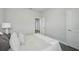 This bedroom features a bed and views through to the doorway to another room at 3062 Bootlace Way, St Cloud, FL 34771