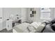 Cozy bedroom with a modern desk and stylish decor at 3062 Bootlace Way, St Cloud, FL 34771