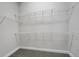 A walk-in closet featuring a wire shelving system for efficient storage and organization at 3062 Bootlace Way, St Cloud, FL 34771