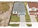 Aerial view of a house showing the roof and driveway at 5753 Wallis Ln, St Cloud, FL 34771