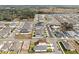 Aerial view of a large residential development featuring new homes and a community pool at 5753 Wallis Ln, St Cloud, FL 34771