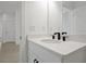 Simple bathroom with white vanity and black fixtures at 5753 Wallis Ln, St Cloud, FL 34771