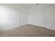 Simple bedroom with neutral walls and carpet flooring at 5753 Wallis Ln, St Cloud, FL 34771