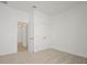 Bedroom with carpet flooring and access to another room at 5753 Wallis Ln, St Cloud, FL 34771