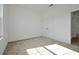 Spacious bedroom with neutral carpeting and double door closet at 5753 Wallis Ln, St Cloud, FL 34771