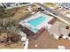 Aerial view of community pool, clubhouse, and surrounding area at 5753 Wallis Ln, St Cloud, FL 34771