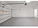 Clean and bright garage featuring an automatic opener at 5753 Wallis Ln, St Cloud, FL 34771
