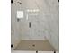 Large walk-in shower with marble tile at 5753 Wallis Ln, St Cloud, FL 34771