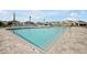 Inviting community swimming pool with ample deck space and lounge chairs at 5753 Wallis Ln, St Cloud, FL 34771