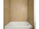 Clean bathroom with a neutral tile shower/tub combination at 5783 Greenery Ln, St Cloud, FL 34771