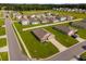 Beautiful aerial view of the home, street, and manicured lawns at 684 Se 65Th Ter, Ocala, FL 34472