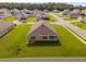 Aerial view of the well-maintained lawn and fenced-in backyard at 684 Se 65Th Ter, Ocala, FL 34472