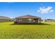 Expansive green backyard perfect for outdoor activities and relaxation at 684 Se 65Th Ter, Ocala, FL 34472