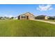 Inviting single-Gathering home with a well-manicured lawn and attached two car garage at 684 Se 65Th Ter, Ocala, FL 34472