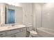 Bathroom with a white vanity, subway tile backsplash, and a shower-tub combo at 4412 Sw 84Th Street Rd, Ocala, FL 34476