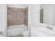 Modern bathroom with a tub, toilet and vanity at 4397 Sw 84Th Street Rd, Ocala, FL 34476