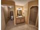 Bathroom with vanity, toilet, shower, and tiled floors at 9930 Se 67Th Avenue Rd, Belleview, FL 34420