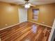 Light and bright bedroom with wood-look flooring at 9930 Se 67Th Avenue Rd, Belleview, FL 34420