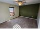 Bedroom with neutral walls, ceiling fan and carpeting at 9930 Se 67Th Avenue Rd, Belleview, FL 34420