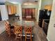 Kitchen features granite countertops and wood cabinets at 9930 Se 67Th Avenue Rd, Belleview, FL 34420