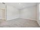 Spacious bedroom with gray carpet and window at 2724 Oxford St, Orlando, FL 32803