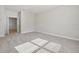 Large bedroom featuring gray carpeting and an open door at 2724 Oxford St, Orlando, FL 32803