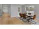 Bright dining room with light wood floors and modern furnishings at 2724 Oxford St, Orlando, FL 32803