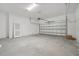 Spacious garage with white walls and concrete floor at 2724 Oxford St, Orlando, FL 32803