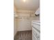 Bright closet with wire shelving and built-in dresser; perfect for organization and storage solutions at 3445 Roanoke St, The Villages, FL 32162