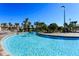 Lazy river style pool with a wooden bridge at 9151 Wedge Dr, Davenport, FL 33896