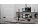 Close-up of the kitchen island with granite countertops and stainless steel appliances at 225 Diesel Rd, Mulberry, FL 33860