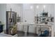 Well-lit kitchen showcasing stainless steel appliances, granite countertops, and modern cabinetry at 225 Diesel Rd, Mulberry, FL 33860