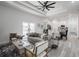 Open floor plan connects the living room and dining area with a modern, stylish design and plenty of light at 225 Diesel Rd, Mulberry, FL 33860