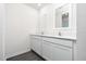 Double vanity bathroom with white cabinets and quartz countertop at 3740 Bergamot St, Lake Alfred, FL 33850