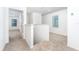 Upstairs hallway with carpet, showing access to bedrooms and stairs at 3740 Bergamot St, Lake Alfred, FL 33850